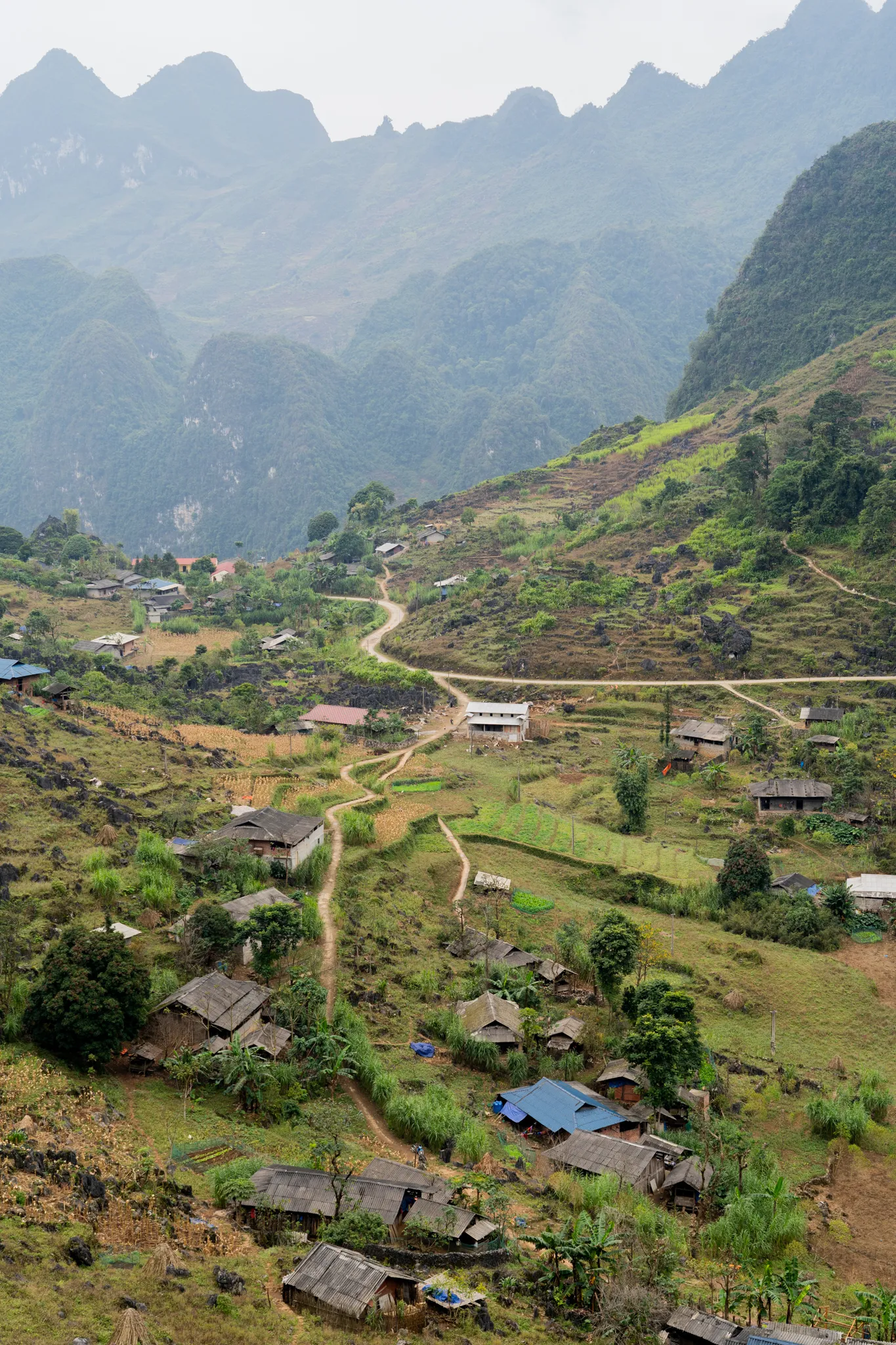 Terraced hamlet scattered along a limestone karst valley