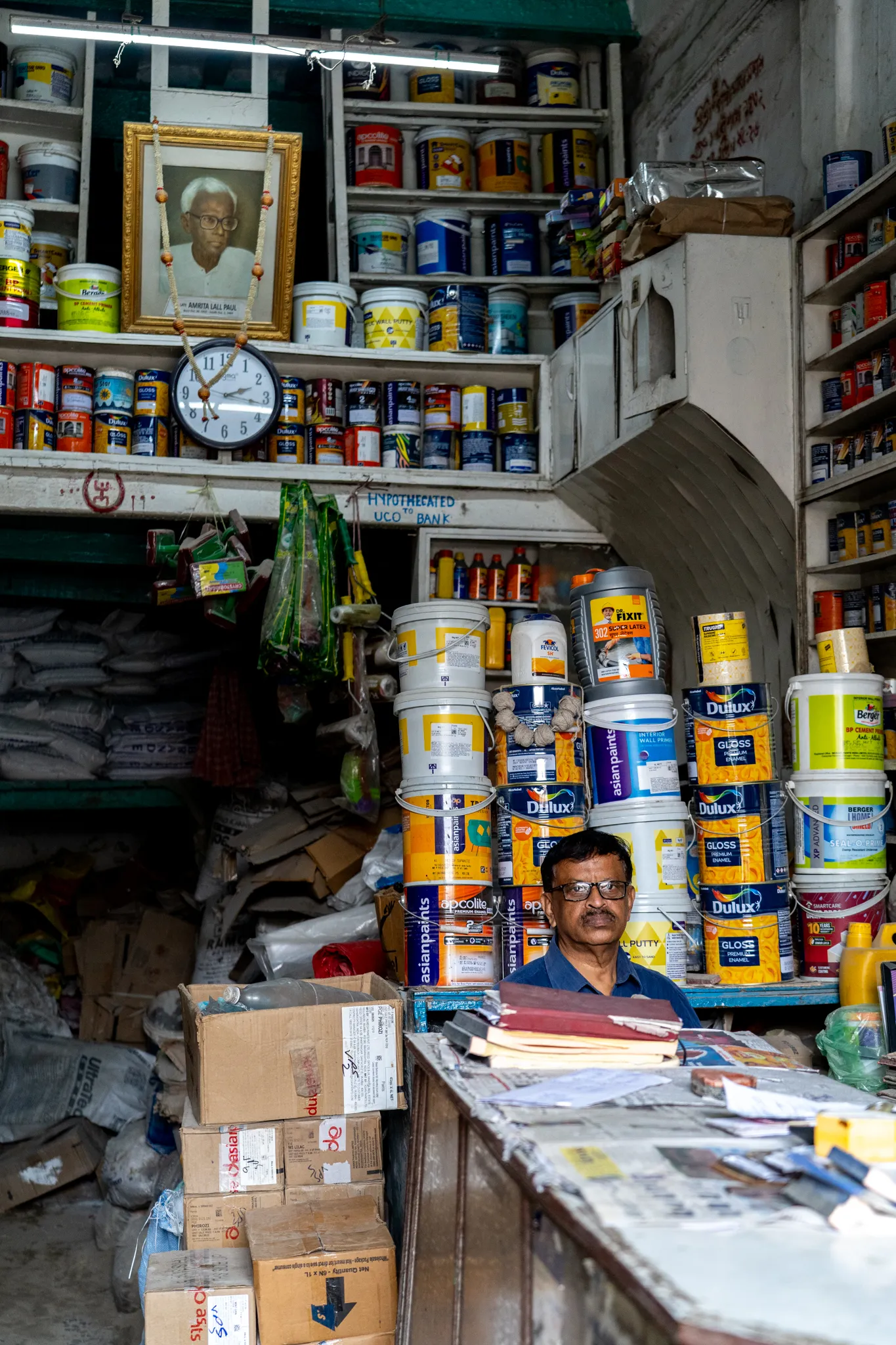 stocked shelves on a corner store, India