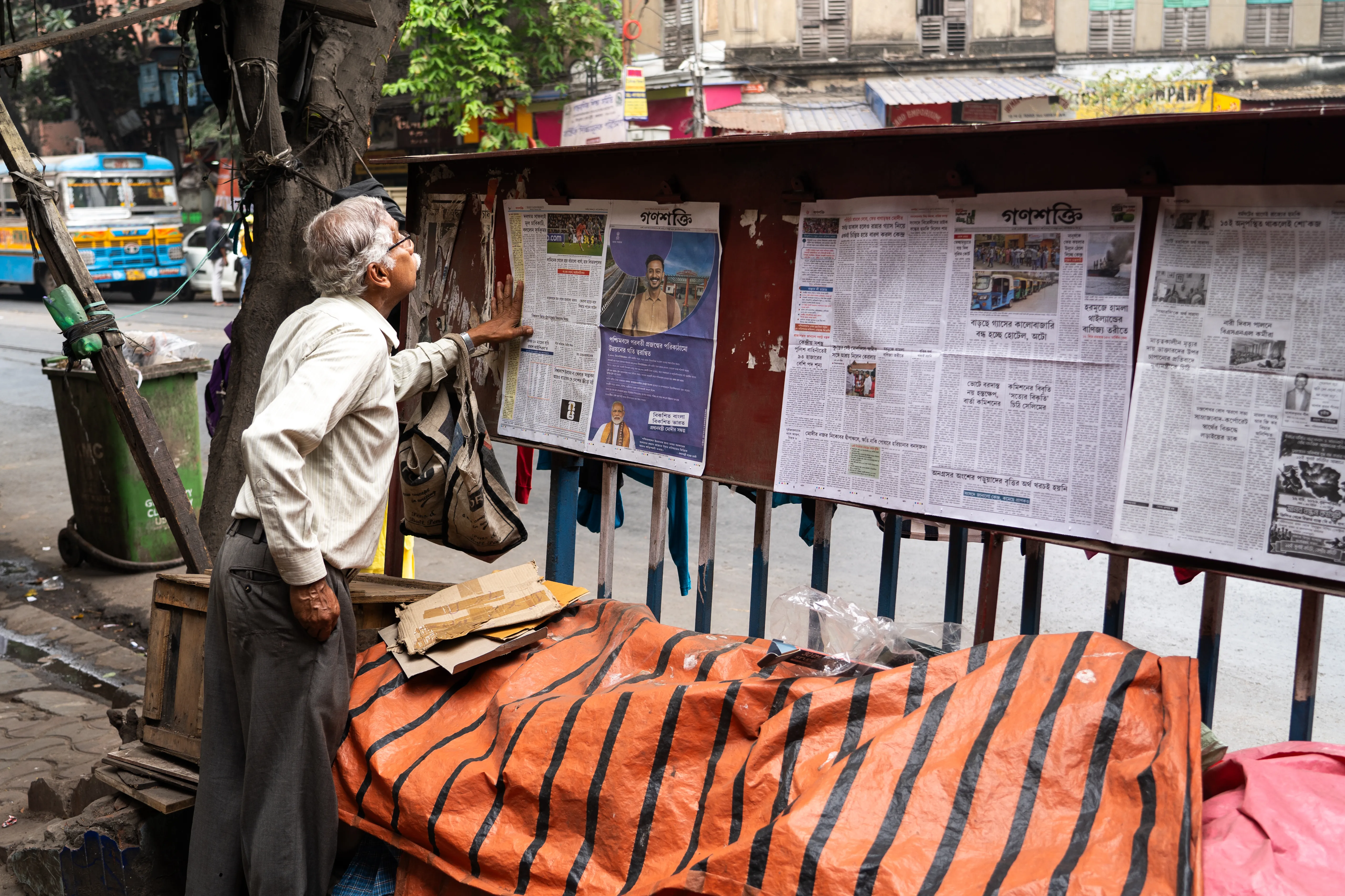Sorting through the morning's newspapers, India