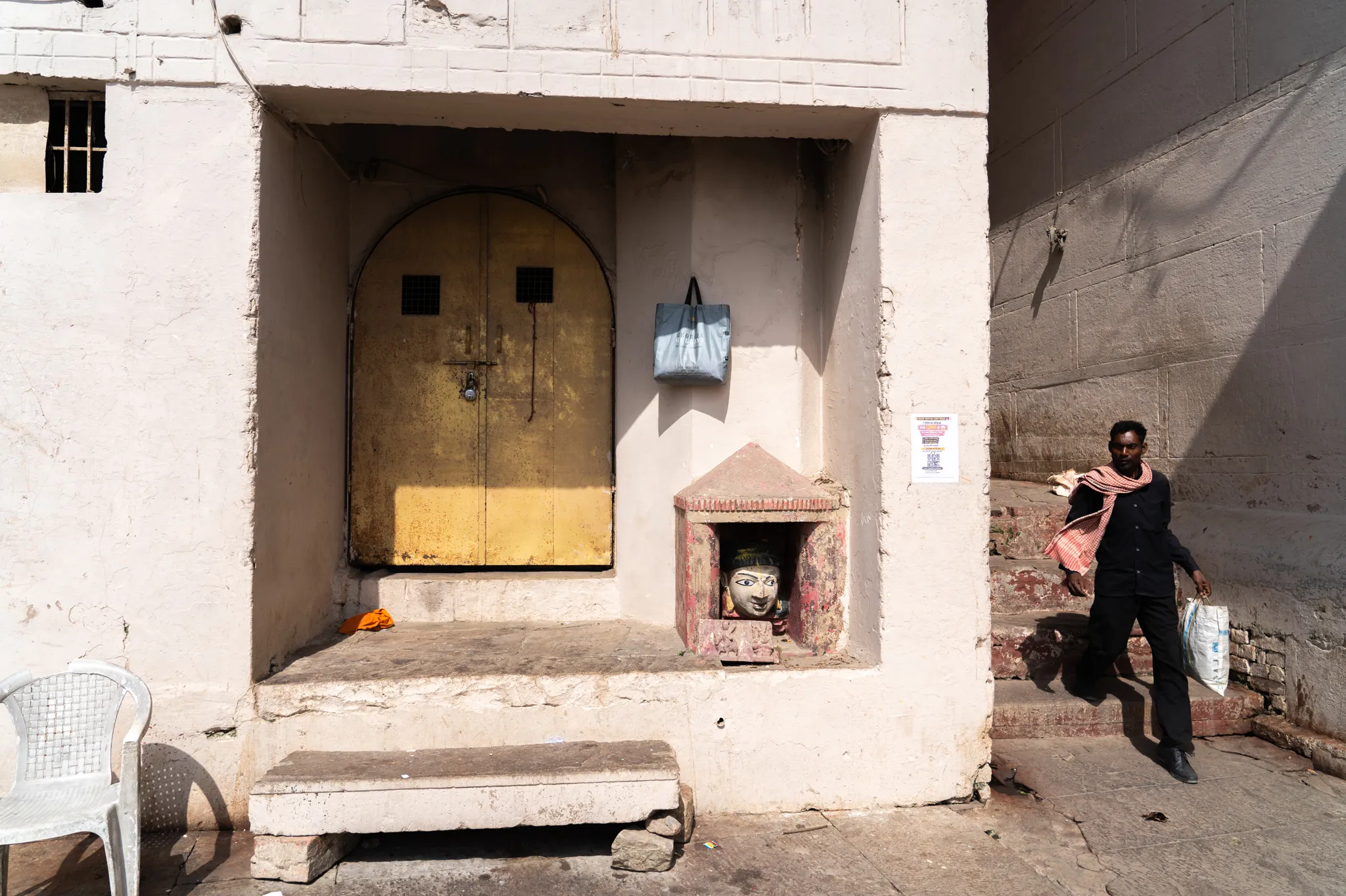Passing a riverside shrine in Varanasi, , India