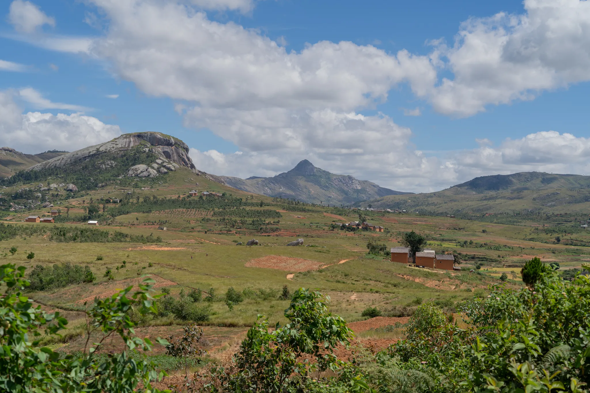 Farmland below a granite outcrop