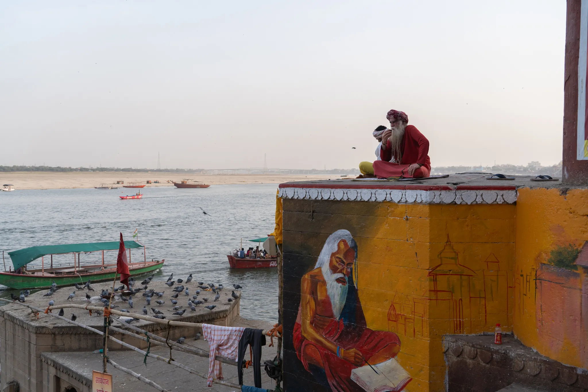 Sadhu perched over Varanasi, India