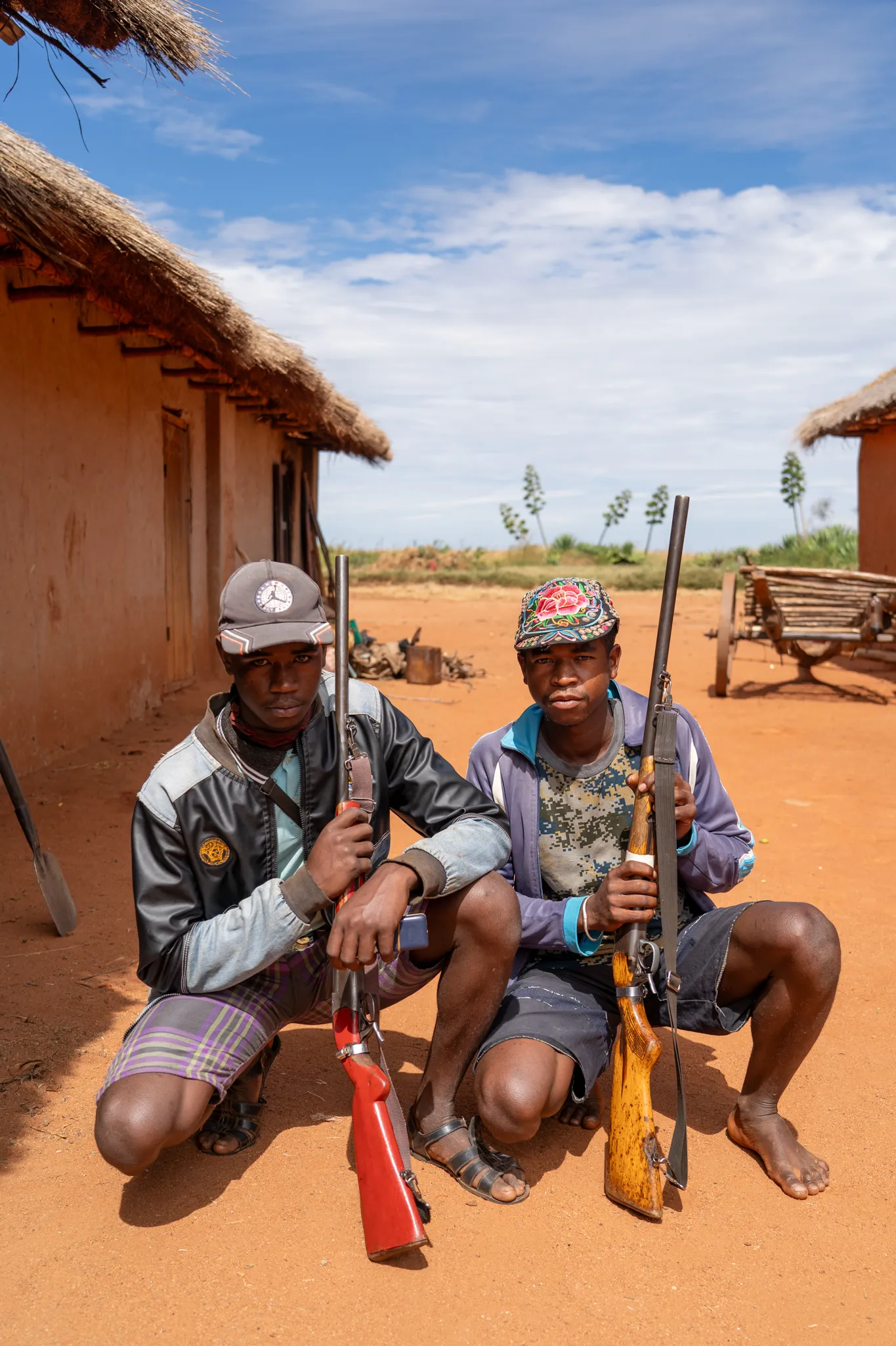 Two young hunters with rifles
