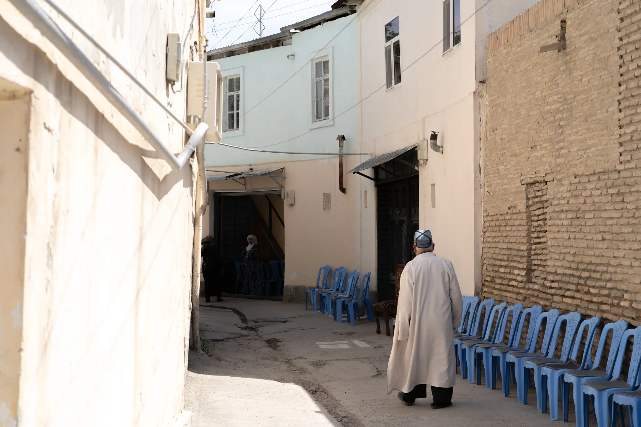 Man walking through Bukhara, Uzbekistan