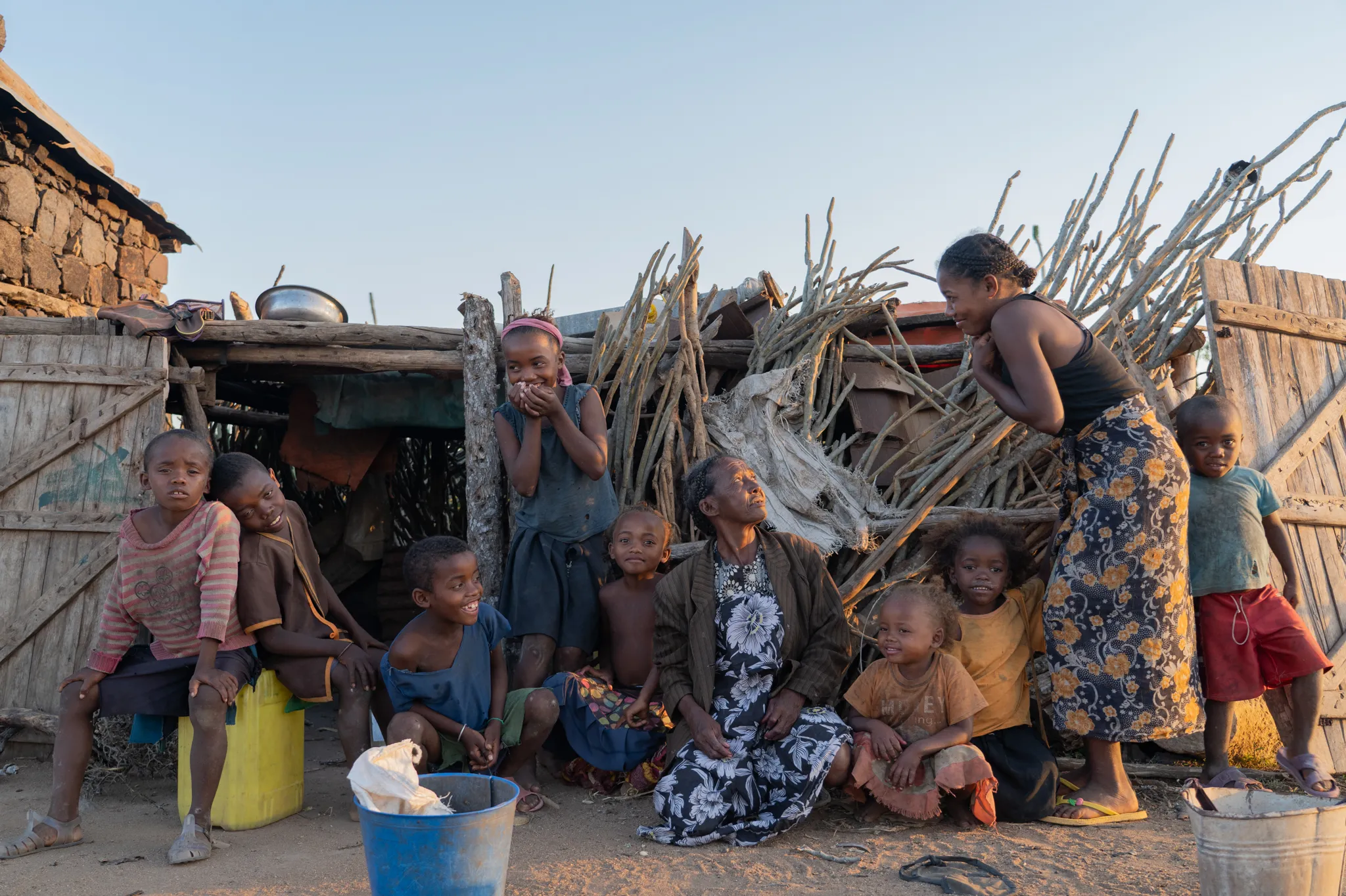 Androy family gathered outside their home, Madagascar