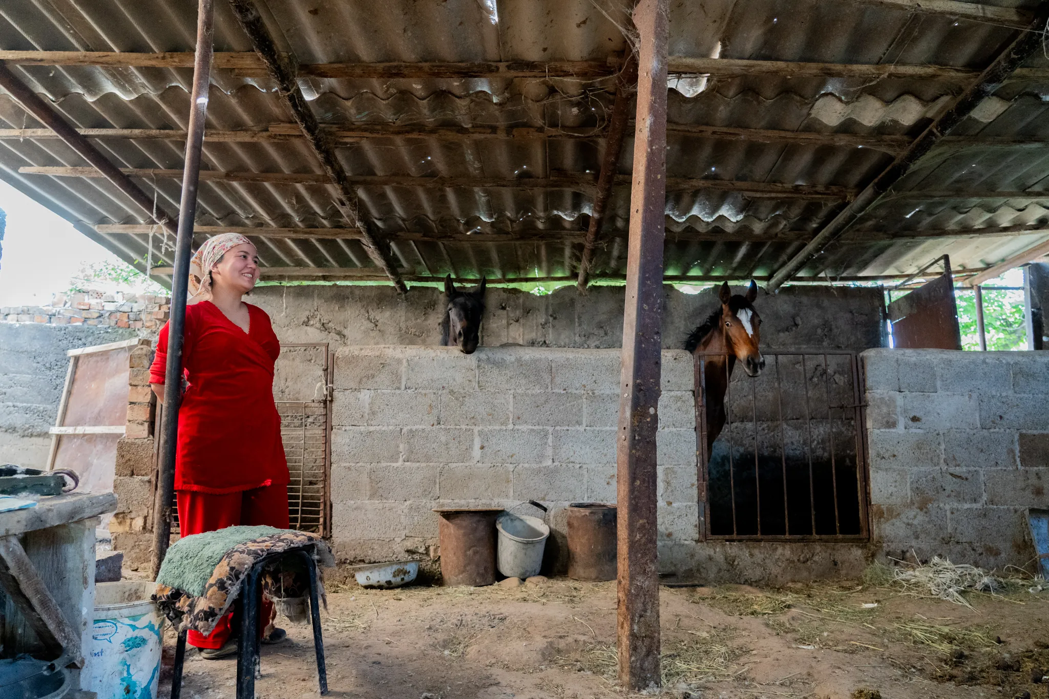 Woman in front of her horse, Kyrgyzstan