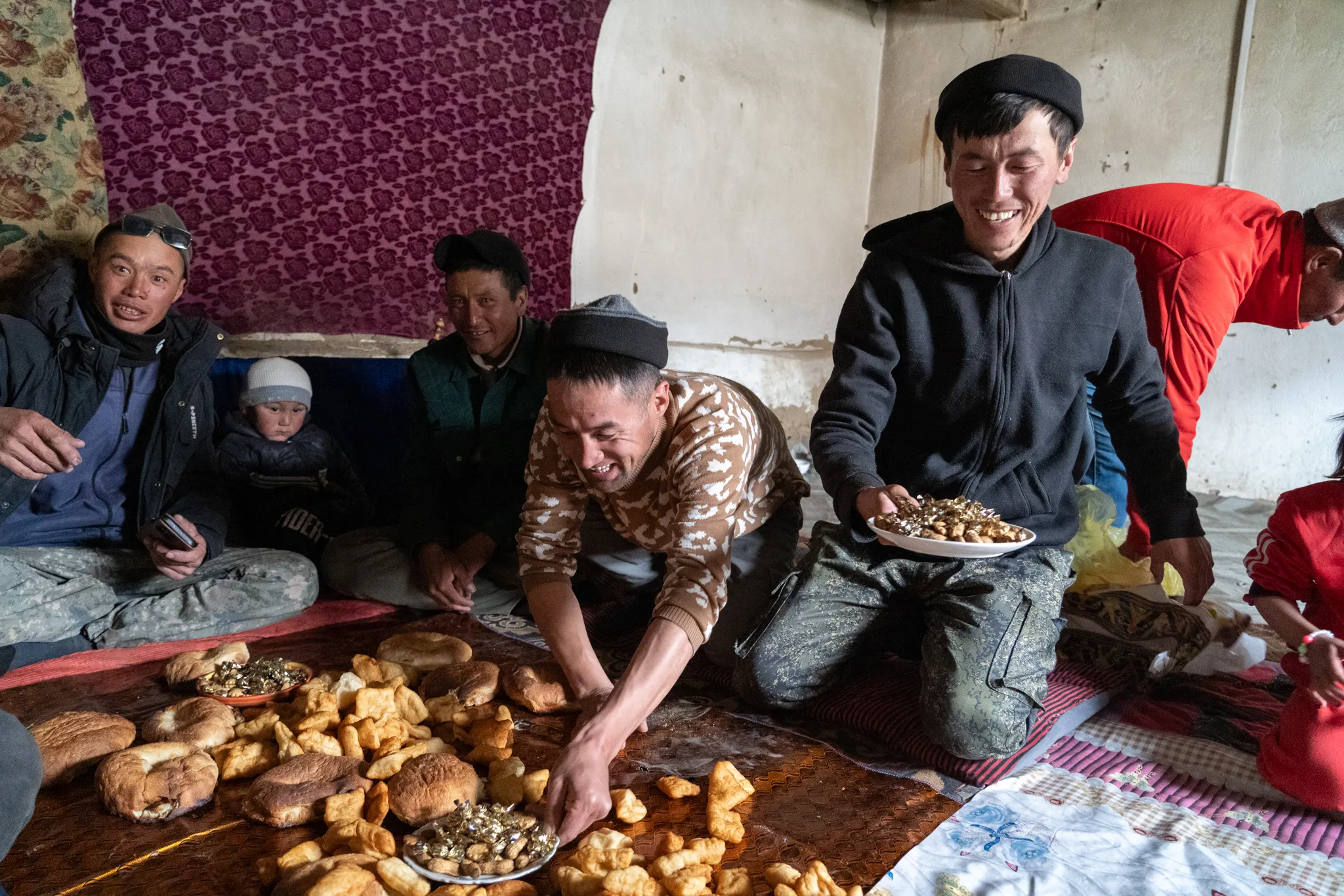 Eating bread and sweets on Eid al-Adha, Tajikistan