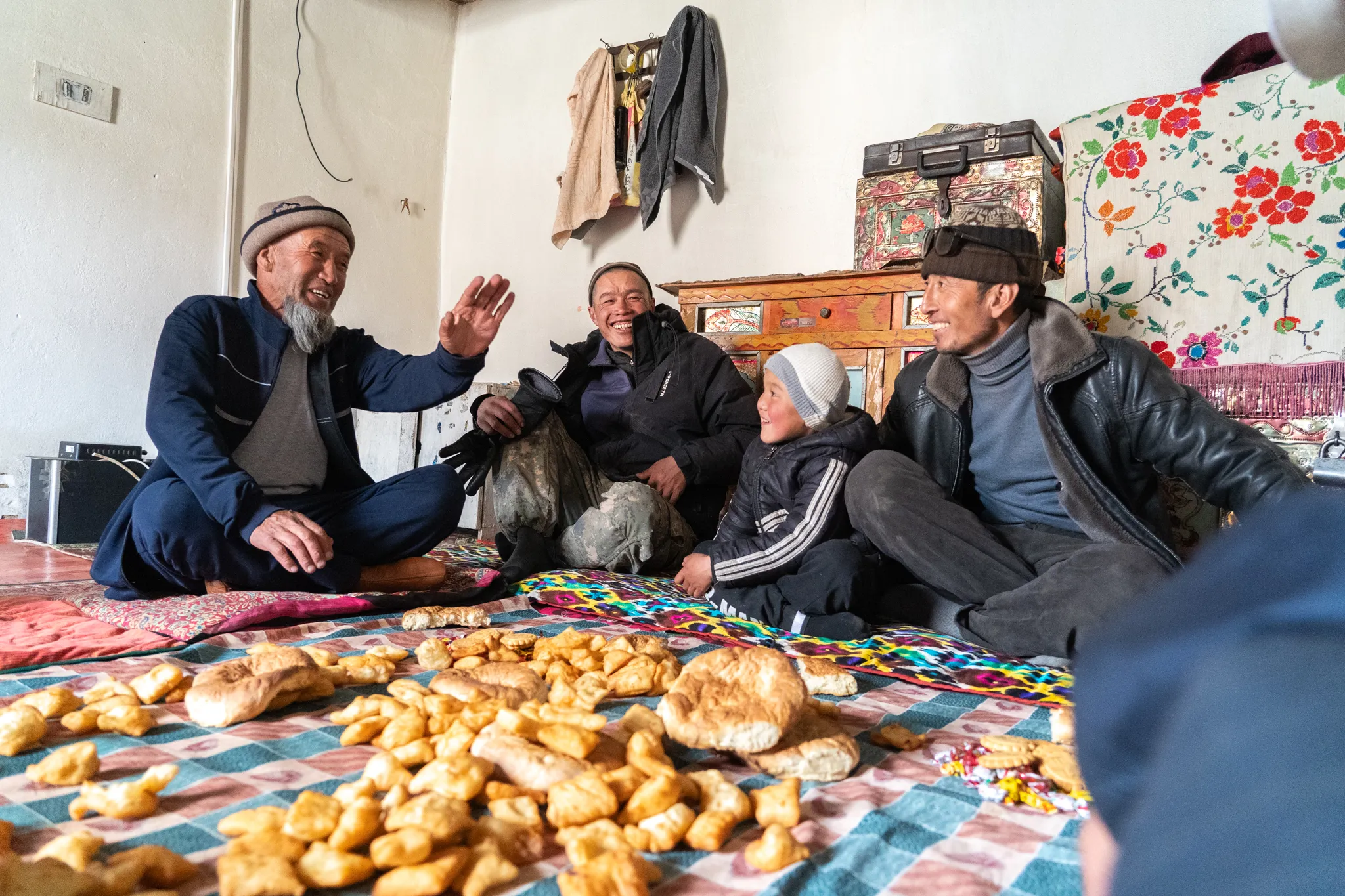 Tea and bread shared over conversation during Eid al-Adha, Tajikistan