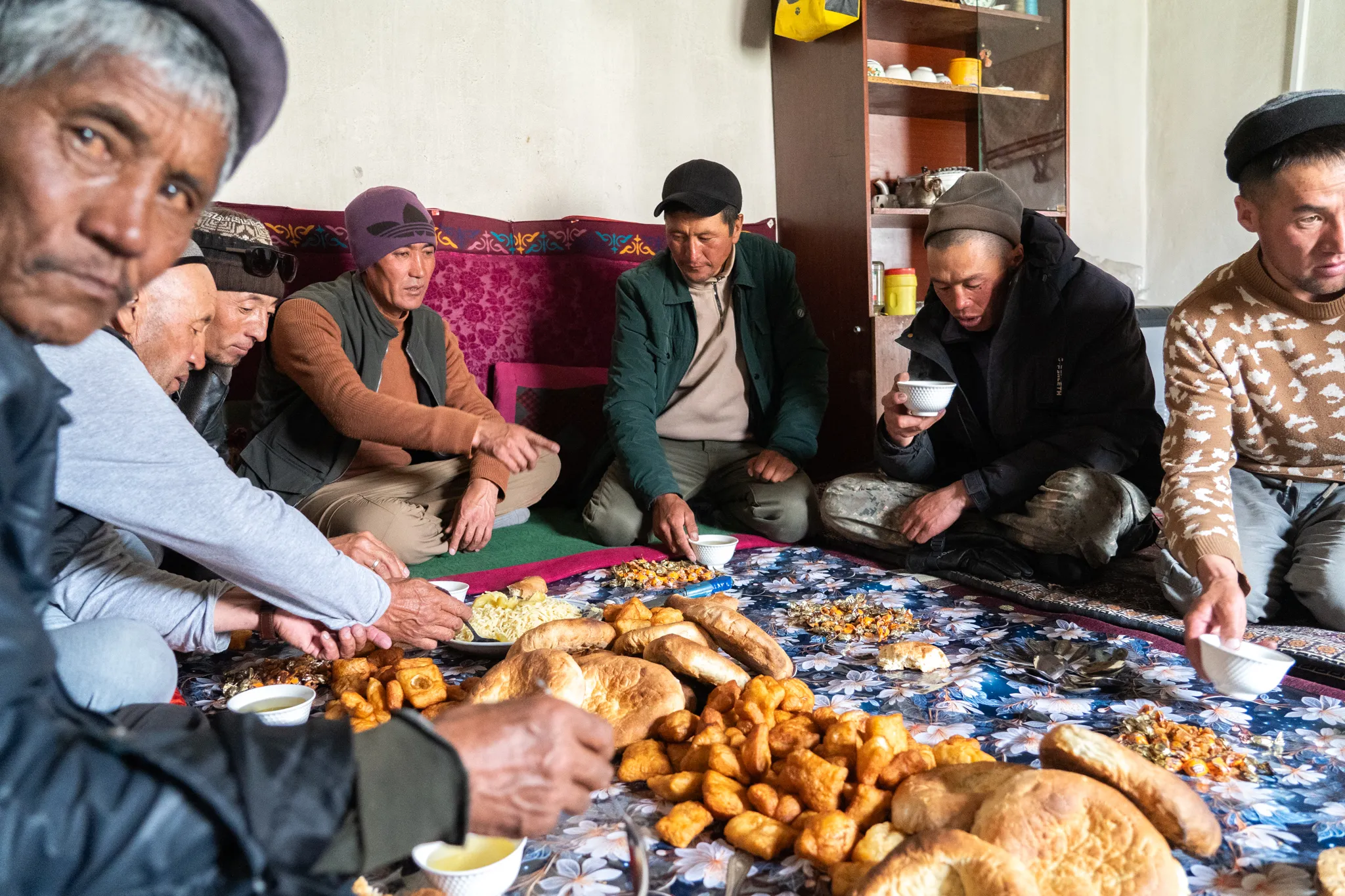 Eating bread and sweets on Eid al-Adha, Tajikistan