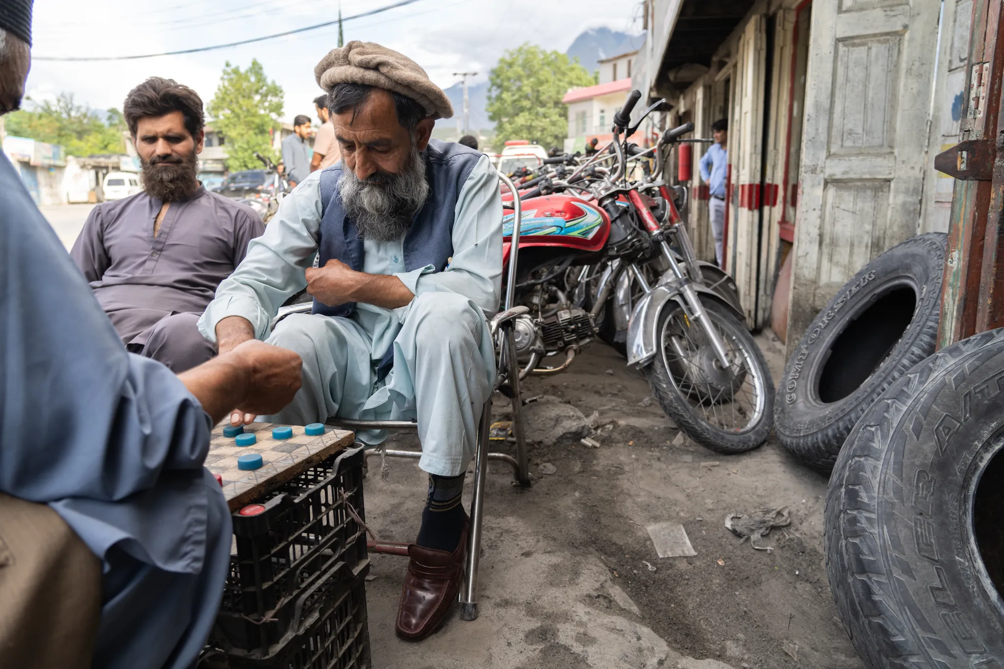 Men playing game, Pakistan