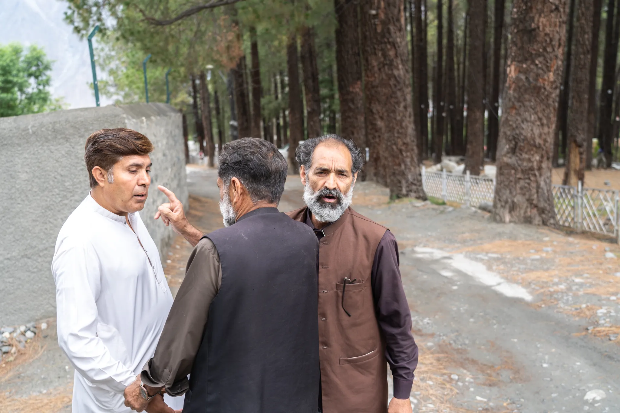 Men having a friendly argument, Pakistan